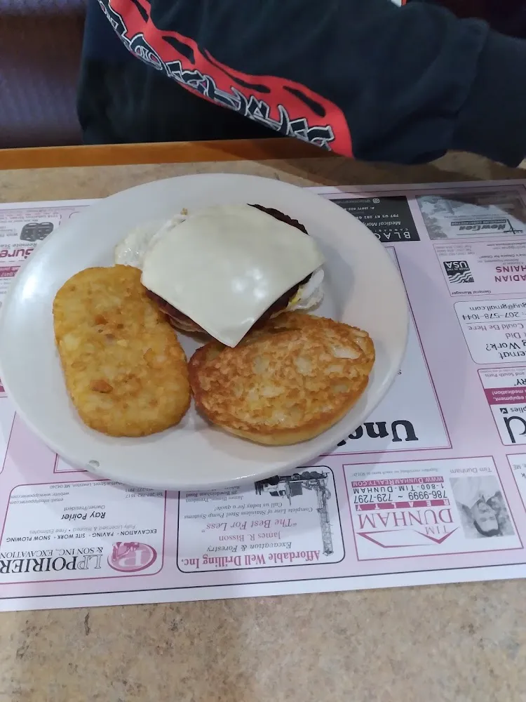 Sausage Egg and Cheese on an English Muffin and Hashbrown Patty